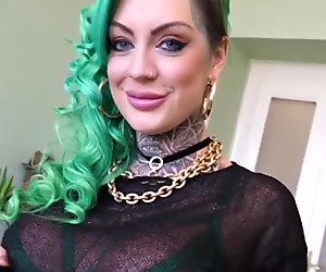 Tattooed whore sucking